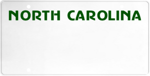 USA license plate North Carolina green text