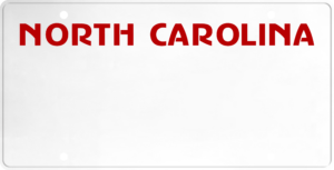 USA license plate North Carolina red text