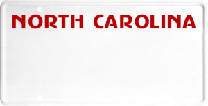 USA license plate North Carolina red text