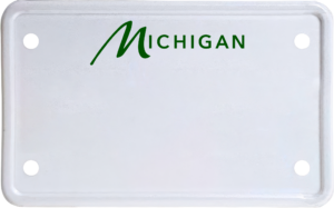 USA license plate Michigan green text