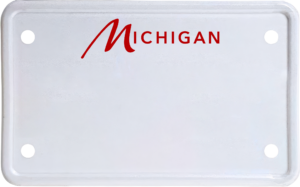 USA license plate Michigan red text