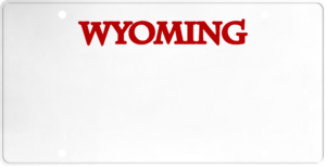 USA license plate Wyoming red text