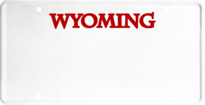 USA license plate Wyoming red text