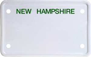 USA license plate New Hampshire green text