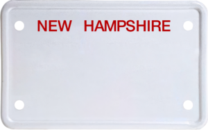 USA license plate New Hampshire red text