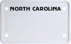 USA license plate North Carolina black text