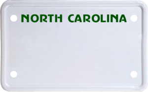 USA license plate North Carolina green text