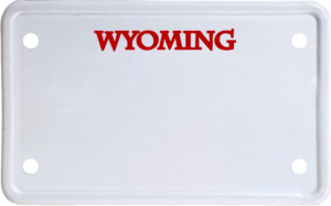 USA license plate Wyoming red text